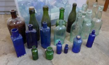 A large collection of vintage glass bottles