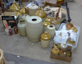 A large quantity of assorted stoneware flagons, jars, etc. includes Cheavins filter, chip on lid,