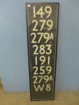 A framed section of London bus destination number roll