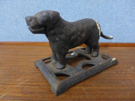 A cast iron dog shaped nutcracker
