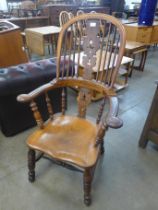A 19th Century elm and yew wood highback Windsor chair