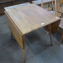 An Ercol Blonde elm and beech Windsor drop-leaf table