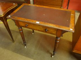A Victorian mahogany single drawer writing table
