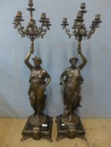 A pair of large French style bronze figural candelabrum