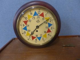 An R.A.F. style circular beech fusee wall clock