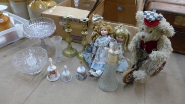 A pair of brass candlesticks, glassware, dolls, etc.