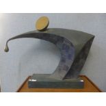 A large abstract bronze mouse sculpture