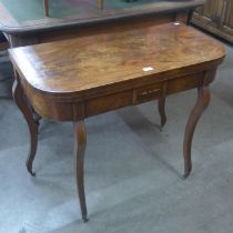 A 19th Century Biedermeier inlaid mahogany fold over card table