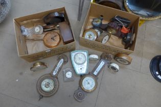 Two boxes of assorted clocks and barometers