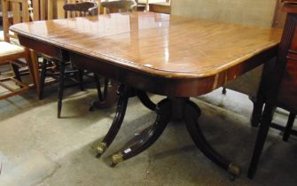 A Regency mahogany extending pedestal dining table