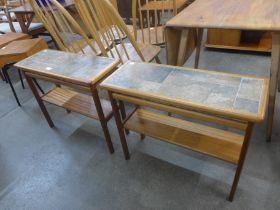 A pair of Danish teak and tiled top coffee tables
