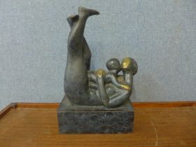 A bronze abstract figure of a mother and child