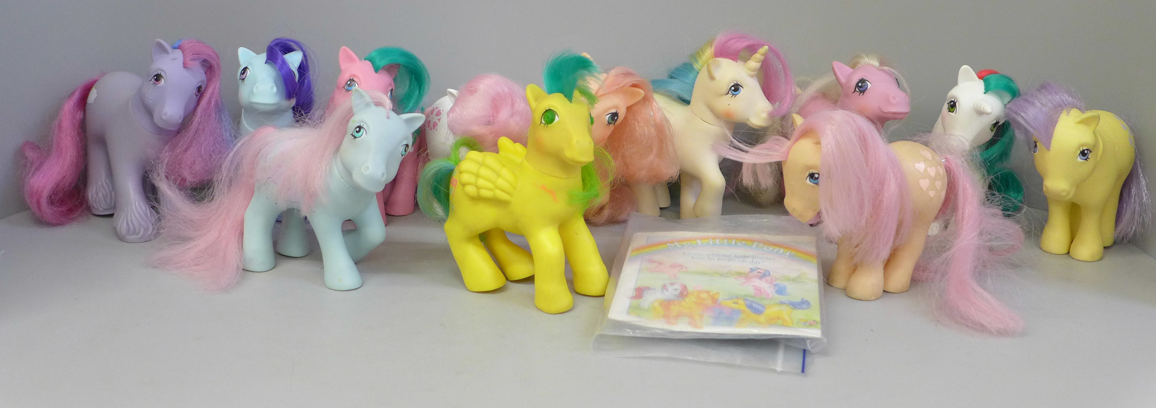 Twelve original 1980s My Little Pony toys, leaflet and ribbon