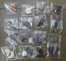 A box of Action Man accessories sorted in individual packets
