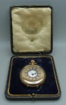 A 9ct gold cased half hunter pocket watch in a fitted case with long service inscription to case