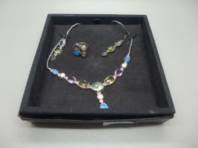 A silver designer gem set necklace, earrings and ring, stones include opal, amethyst, etc.