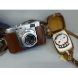 A Voightlander Vito B camera with leather case