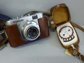 A Voightlander Vito B camera with leather case