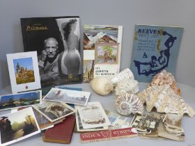 A collection of ephemera including a Picasso Christie's catalogue, postcards, photographs, books and