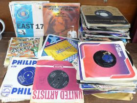 A collection of 7" singles, picture sleeves including The Beatles