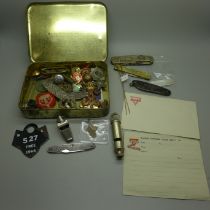 A collection of assorted militaria, buttons, badges, etc.