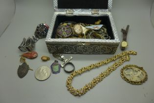 A jewellery box containing costume jewellery