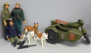 Three Action Man figures, motorbike and side car and three dogs