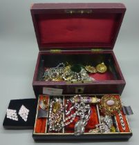 A jewellery box containing costume jewellery including paste set