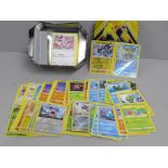 A tin of over 250 Pokemon cards with shiny cards