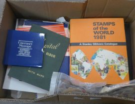 A collection of stamps and albums including first day covers, etc.