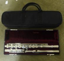 A Jupiter 511E flute, silver plated, key of C with offset A, cased