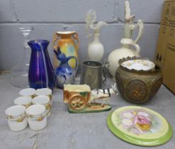 A box of mixed decorative china, metalwares, cranberry glass bowl, iridescent blue glass vase,