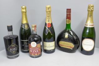 Three bottles of champagne, Moet and Chandon, Oudinot and Laurent Perrier, a bottle of Armagnac