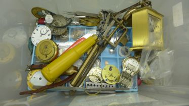 A collection of watch parts including dials, movements, watchmaker's tools, watches and a Swiza 8-