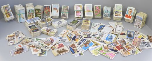 A collection of cigarette cards including Ogdens, Wills and Players