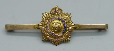 A George V WWI Army Service pin badge, marked 9ct to the reverse of the brooch, 5.9g, enamel a/f