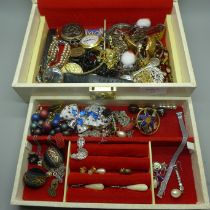 A jewellery box containing costume jewellery