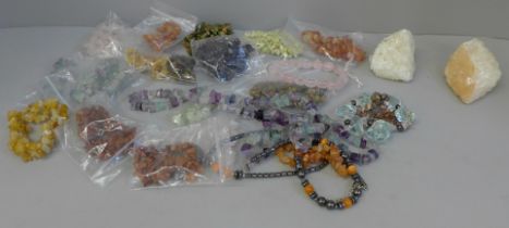 A collection of gemstone bracelets and two crystal geodes