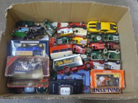 A collection of Lledo and other advertising die-cast model vehicles