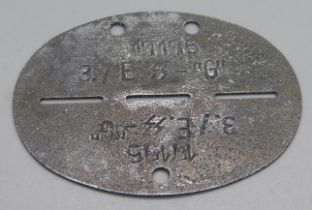 A WWII German Waffen SS soldier's dog tag