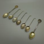 Golfing interest, two lady's silver golfing spoons and five others, 63g