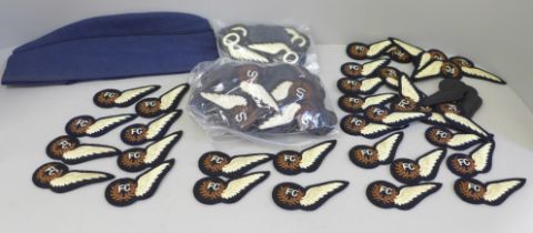 An RAF cap and other insignia