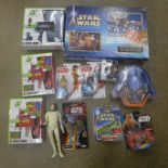 A box of Star Wars toys, collectables, etc.