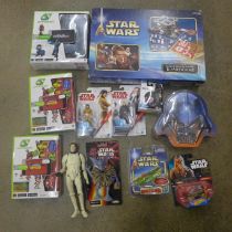 A box of Star Wars toys, collectables, etc.