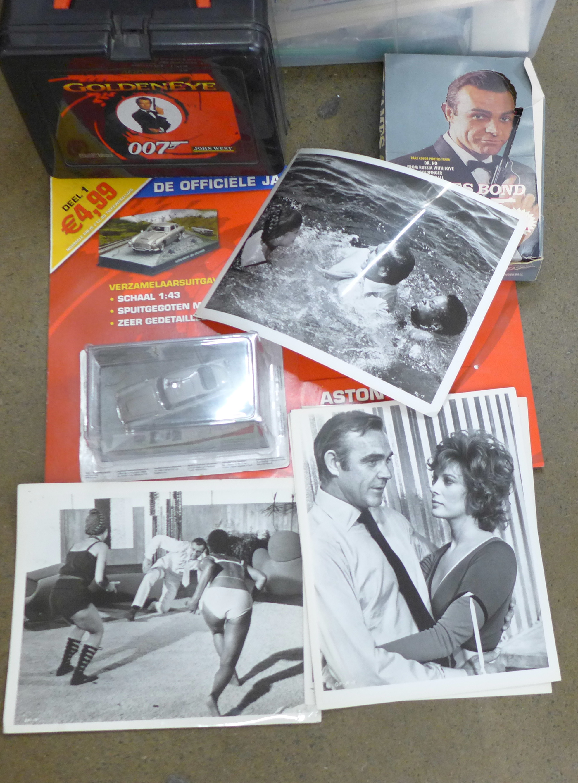 A collection of James Bond toys, etc., including vehicles, a Corgi Toys Aston Martin, etc.