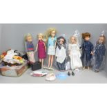 A box of Sindy dolls and clothing