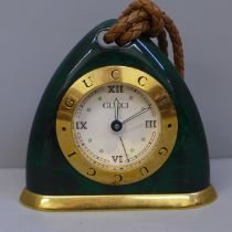 A Gucci malachite travel clock