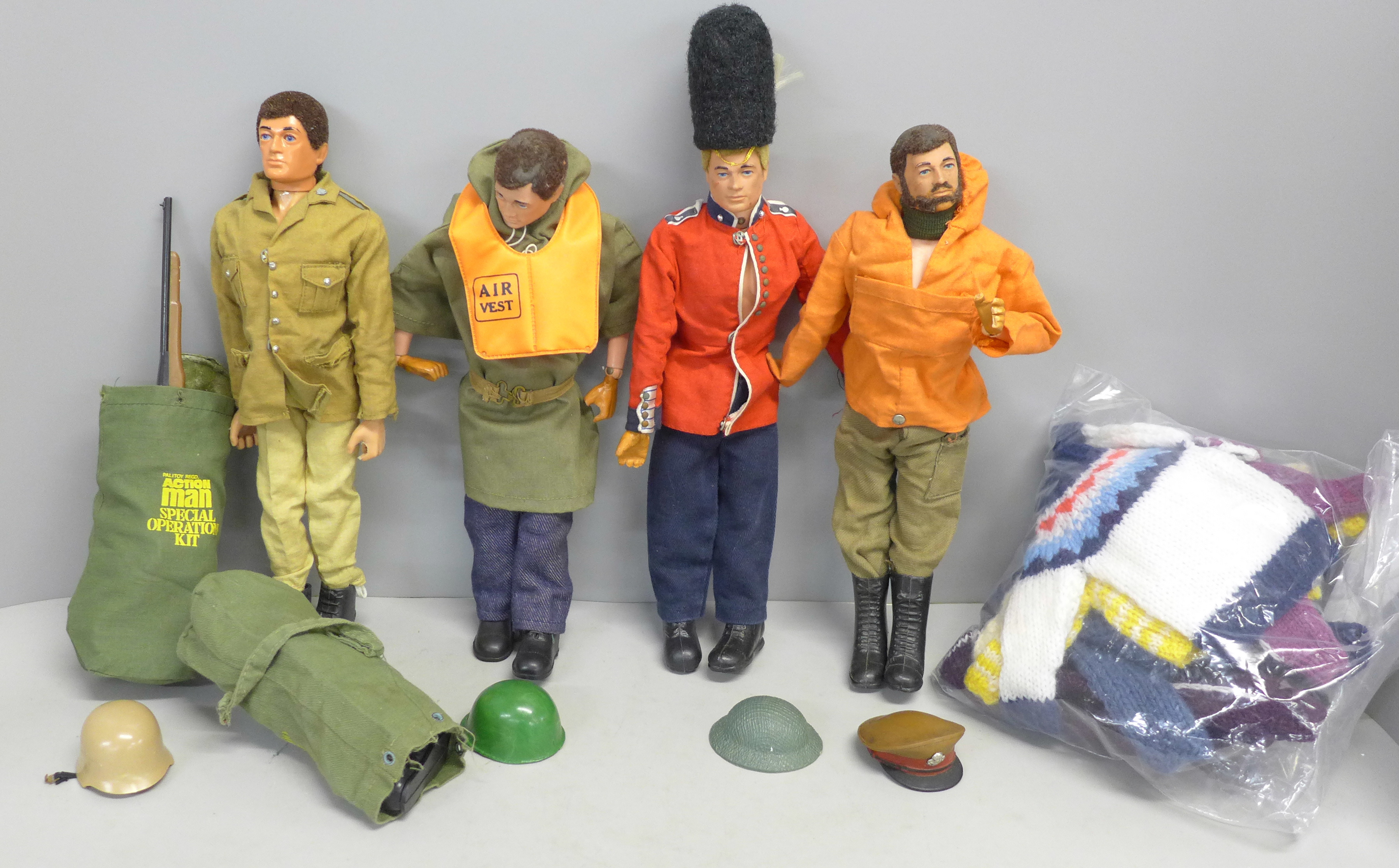 Four vintage Action Man figures and associated clothing