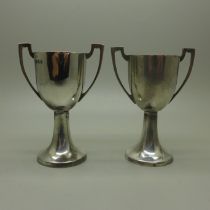 Two handled silver trophies, London marks, 69g
