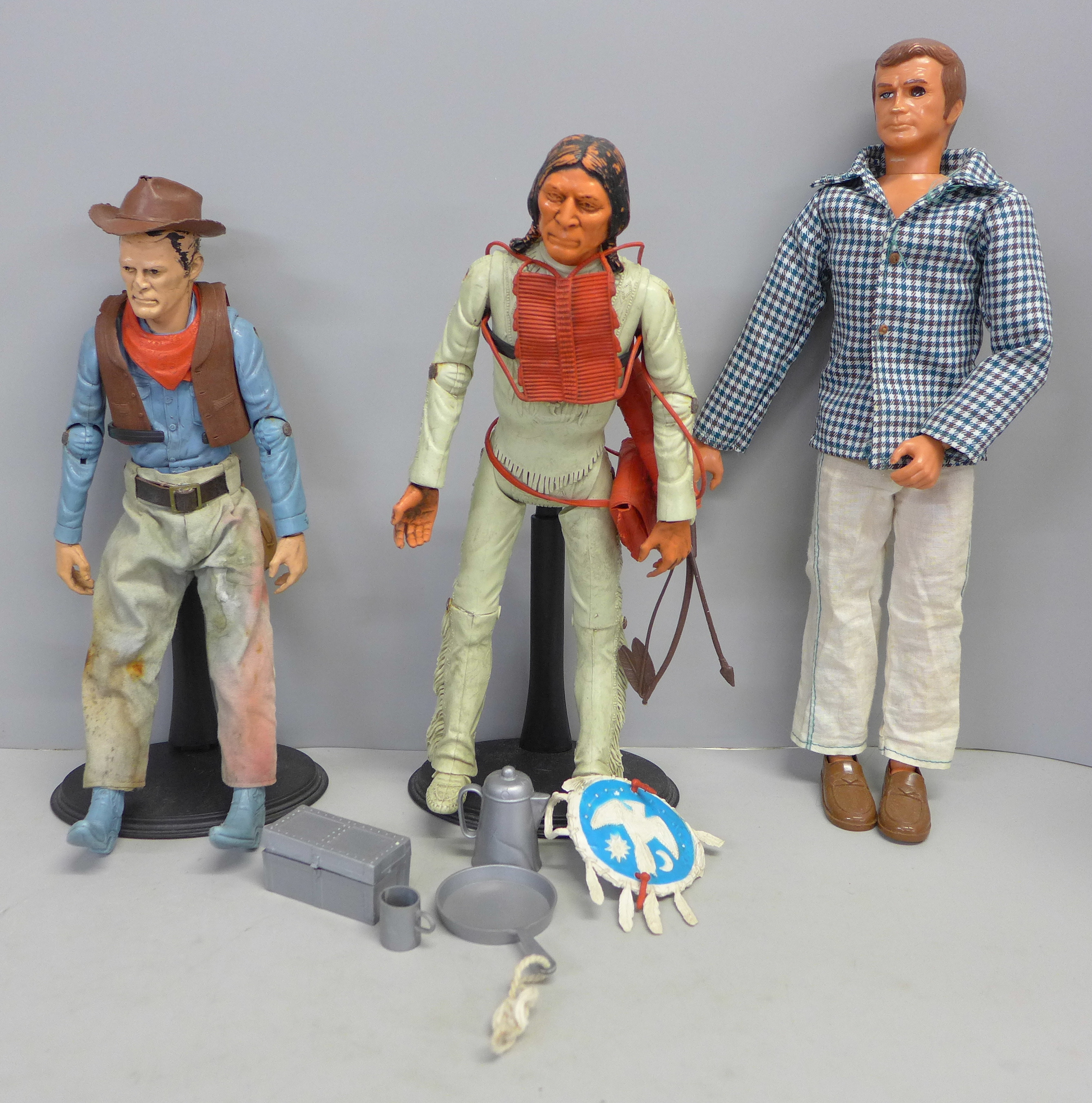 Three vintage action figures including Six Million Dollar Man and Johnny West